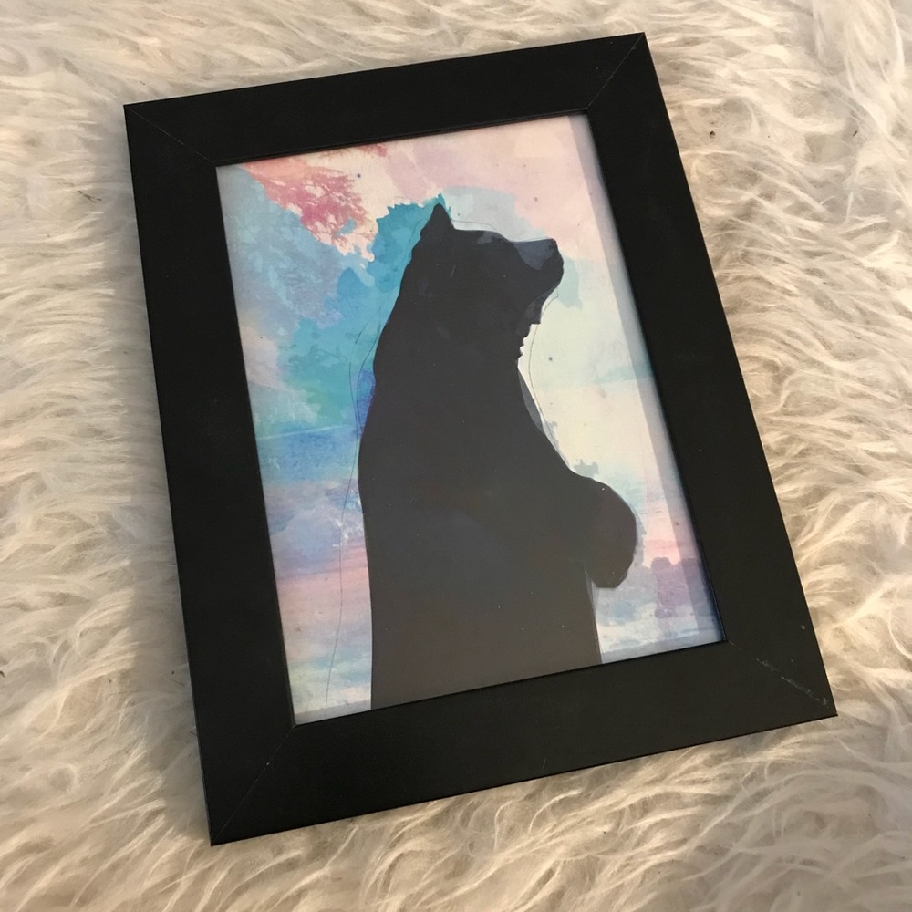 Danielle Noel print card in frame.
